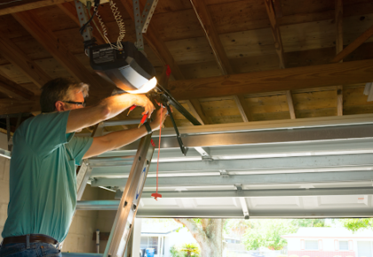 MN Garage Squad performing expert winter garage door repairs to ensure optimal function despite cold weather challenges